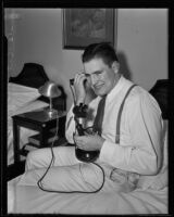 Danno O'Mahony, wrestler, talks on the phone, Los Angeles, 1935
