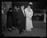 Man and Woman at opening night of the Grand Opera at the Philharmonic Auditorium, Los Angeles, 1932