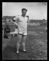 Charlie Paddock in a stadium with other athletes, Los Angeles, circa 1926