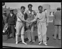 Charley Paddock, Charles Hoff and a third athlete at the Coliseum, Los Angeles, circa 1926