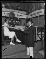 Demonstrators a the Freeman Lang booth at the Eighth Annual National Radio Show, Los Angeles, 1930