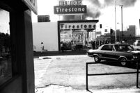 Smoke behind Helmick's Firestone Tires store