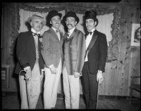 Four men in barbershop quartet dress, [Santa Monica?], 1951