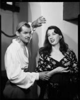 Suzanne Everett and man in pirate costume, 1954
