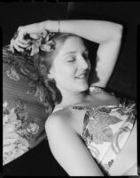 Betty Hanna reclining in a bathing suit, Santa Monica, 1941