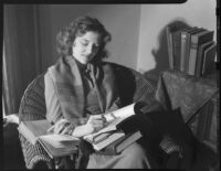 Betty Hanna with books, Santa Monica, 1941