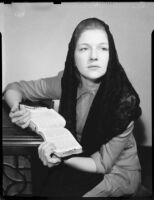 Betty Hanna in mantilla with Bible, Santa Monica, 1941