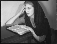 Betty Hanna in mantilla with Bible, Santa Monica, 1941