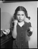 Sylvia Arslan with fists raised, [1939-1940?]