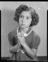 Sylvia Arslan with hands clasped, [1938 or 1939?]