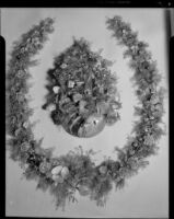 Horseshoe-shaped shell art wreath made in 1888 by poet Ina Donna Coolbrith, Santa Monica, 1940