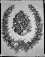 Horseshoe-shaped shell art wreath made in 1888 by poet Ina Donna Coolbrith, Santa Monica, 1940