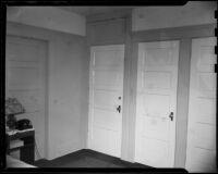 Hotel room with three doors in Windemere Hotel, Santa Monica, 1955