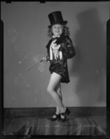 Helena Burnett in tap shoes and tuxedo costume, Santa Monica, 1947-1950
