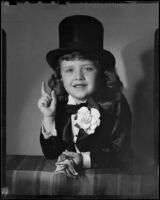 Helena Burnett in tuxedo costume and top hat, Santa Monica, 1947-1950