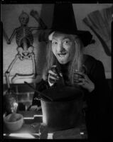 Teresa Kirbe, actress, dressed as a witch, Los Angeles, circa 1950-1959