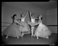 Ballet dancers posing in a classroom, Santa Monica, 1956