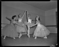 Ballet dancers posing in a classroom, Santa Monica, 1956