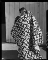 Santa Monica welfare center, Betty Shoemaker, worker with quilt, Santa Monica, 1934