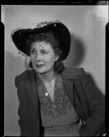 Gloria Udelle Kerruish in a hat with a veil, Santa Monica, 1943-1945