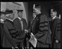 Image of Dr. Cass Arthur Reed, and others [at Pomona College?], (Claremont?], 1928