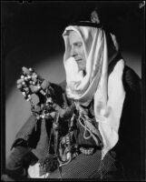Ray Smith, actor or drama student, dressed in Middle Eastern garb, [Long Beach, Santa Monica?], 1939