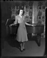 Shirley Roberta Doman with piano, Pacific Palisades, 1943