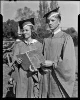 Los Angeles High School seniors, Marjory Schmid and Robert Dryden, in caps and gowns, Los Angeles, 1939