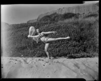 Leonora Preston in first arabesque position at the beach, Santa Monica, 1951