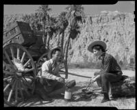 Paul P. Wilhelm and Marcella cooking out at 1000 Palms Ranch, Thousand Palms vicinity, 1939