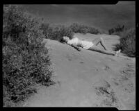 Dorie Doney sunbathing at 1000 Palms Ranch, Thousand Palms vicinity, 1941