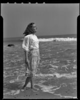 Marjorie Duggan walking at the beach, Santa Monica, 1943