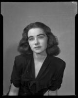 Marjorie Duggan wearing a dark dresse, Santa Monica, 1943