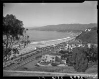 Bird's-eye view towards the entrance to Santa Monica Canyon on the Pacific Coast Highway, Los Angeles, 1946 or 1952