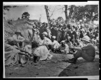 Indigenous Africans conversing with a missionary, Central Africa, 1928-1948