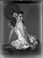 Barbara Tramutto posing in a satin costume, Santa Monica, 1948-1950