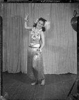 Barbara Lee Tramutto posing in a Hawaiian costume, Santa Monica, 1948-1950