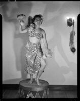 Barbara Lee Tramutto dancing Polynesian-style costume, Santa Monica, 1951