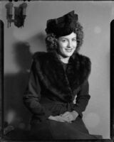 Sue Ackerman Monkman in coat and hat, 1945