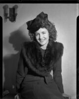 Sue Ackerman Monkman in coat and hat, 1945