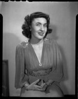 Singer Betty Jo Lefebvre in gathered dress, [1951?]