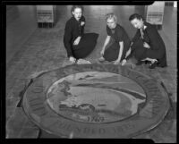 Santa Monica City Hall dedication, three women and city seal, Santa Monica, 1939
