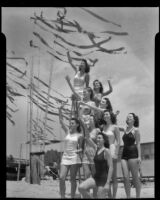 Salt Water Carnival Queen and her court in pyramid formation, Santa Monica Beach, 1940