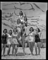 Salt Water Carnival Queen and court in pyramid formation, Santa Monica Beach, 1940