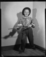 Rickey Gables dressed as a ventriloquist, Santa Monica, 1957