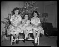 Daralyn, Janis and Sharisse Milne at Christmas time, Santa Monica, circa 1957 or 1958