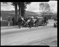 Car crash on a road, possibly in Palm Springs, 1930s