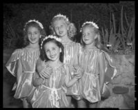 Four young ballet students in costumes for a performance of "Vacation Travel Memories," Santa Monica, 1956