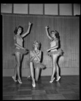 Judy Mahood, Alicia Mowat, and Carolyn Crane, ballet students, in costume, 1956