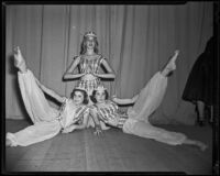 Judy Mahood, Alicia Mowat, and Carolyn Crane, ballet students, in costume, 1956